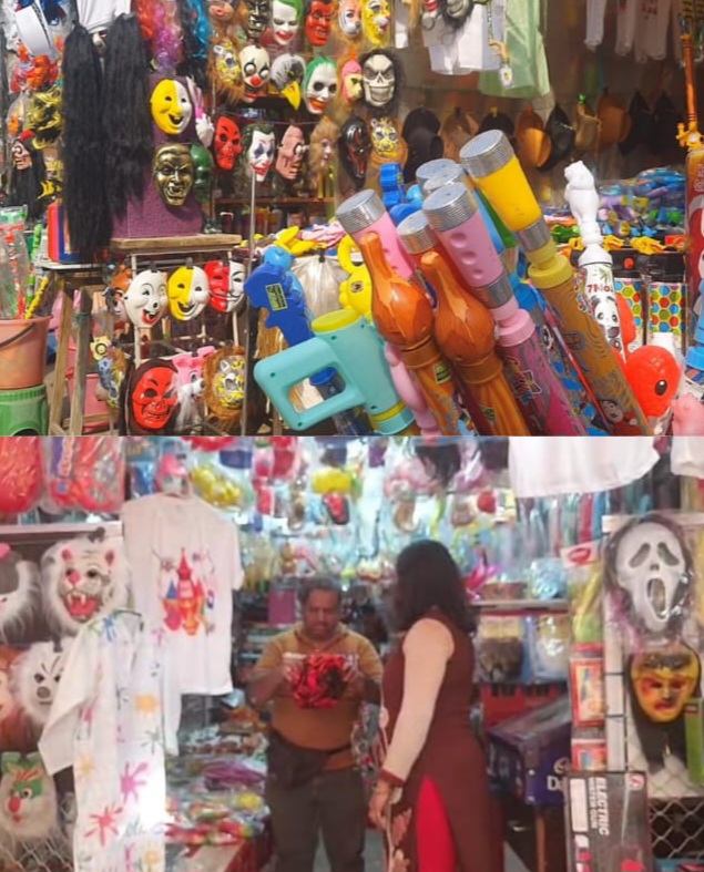 दुकान में मुखौटा और पिचकारी दुकान में मुखौटा और पिचकारी